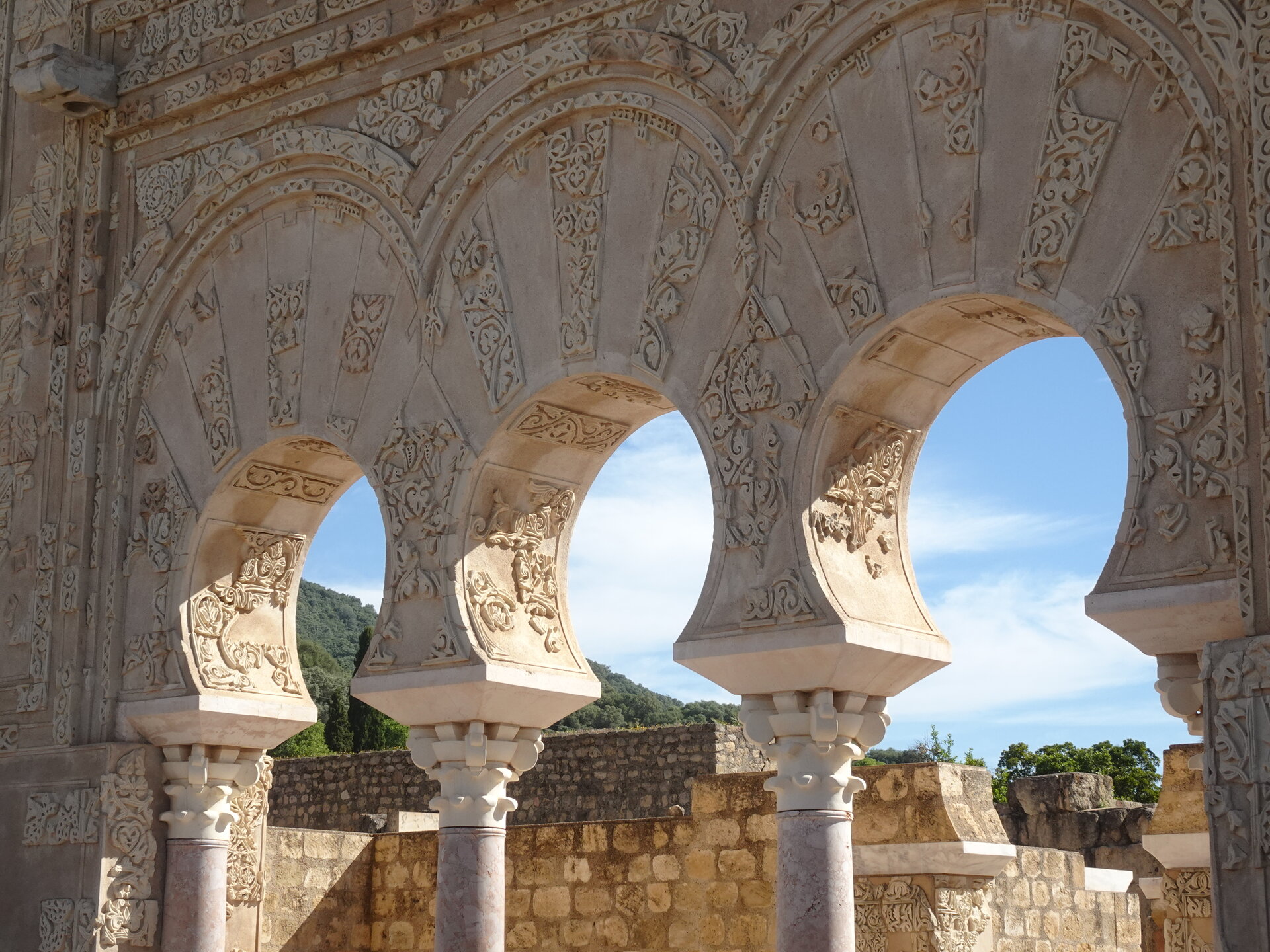Intricately carved horseshoe arches at the ruins of Medina Azahara